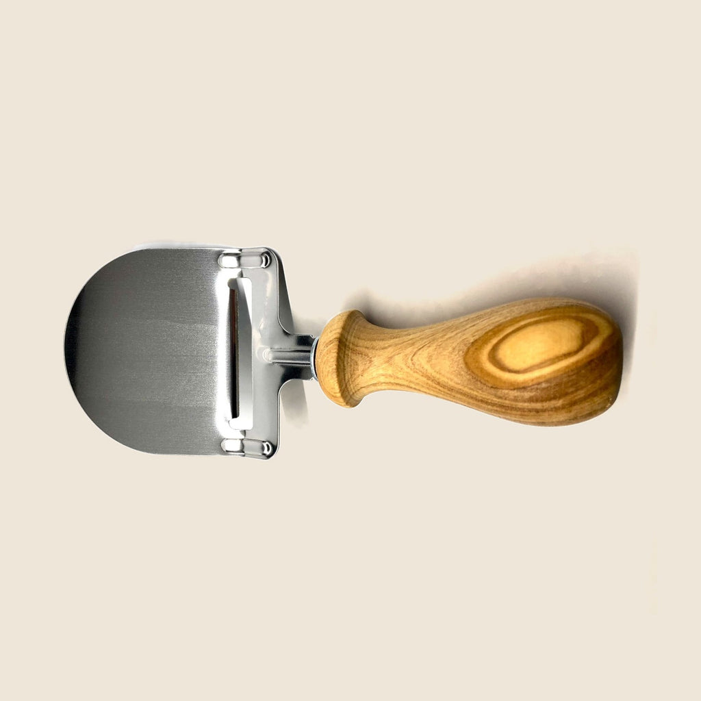Käsehobel DESIGN mit gedrechseltem Griff aus Olivenholz